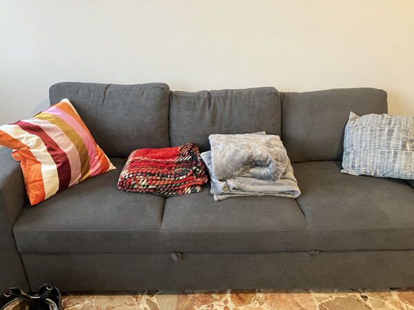 Sofa, blankets and cushions