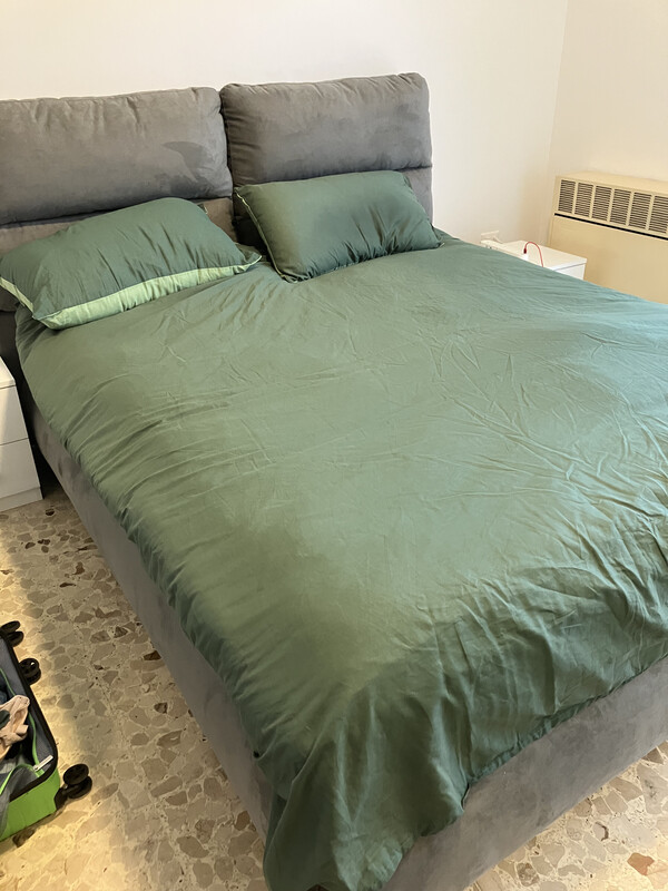 Bed and pillows in the small room