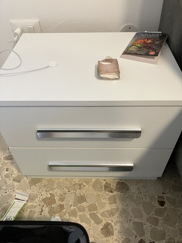 Bedside tables in the small room